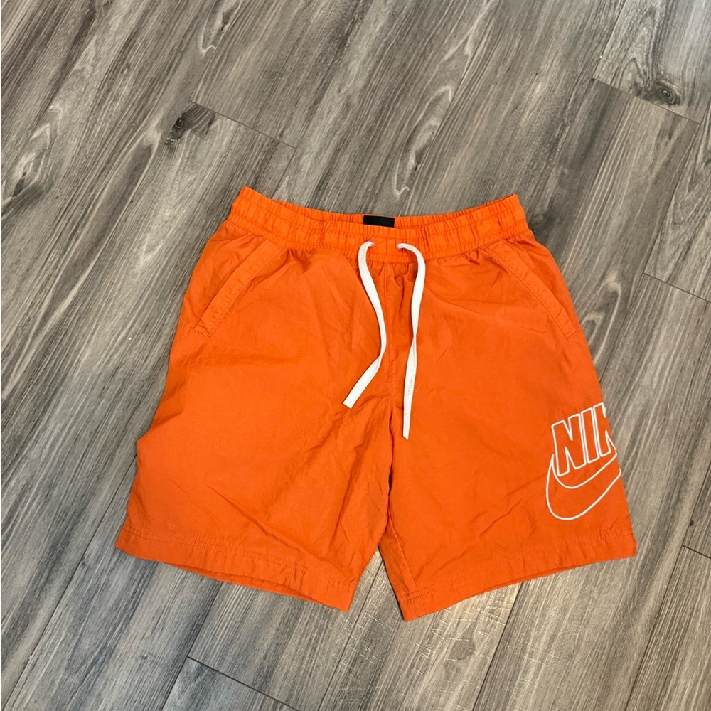 Men’s orange Nike shorts